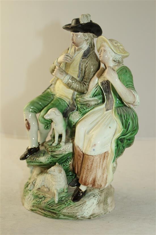 A Ralph Wood (the younger) lead-glazed group of a shepherd and shepherdess, c.1780-1800, 24.7cm, part of horn replaced and other slight